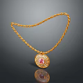 Gold Chain Necklace Featuring Oval Pendant With Red Gemstone And Diamond Accents