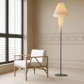 White Cushioned Wooden Accent Chair With Floor Lamp By Window And Paneled Wall