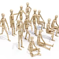Collection of Wooden Humanoid Dolls in Various Poses Standing and Sitting