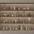 Ceramic Vessels Display on Multi Tiered Shelves with Neutral Tones and Varied Forms