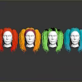 Colorful Long Curly Wigs in Red Orange Green Blue on Mannequin Heads for Daily Use