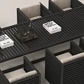 Outdoor Long Black Slatted Top Table With Beige Cushioned Chairs