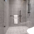 Modern Shower Sauna With Gray Tiled Walls Glass Enclosure Black Metal Hardware And White Towel