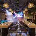 Elegant Restaurant Interior Design With Wooden Decor Hanging Lights Plants And Dining Tables