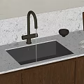 Kitchen Sink with Brushed Brass Faucet Light Gray Countertop Black Bowl and Wooden Cabinets