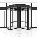 Modern Revolving Door With Black Frame And Glass Panels On Marble Floor