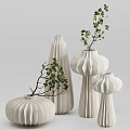 Minimalist White Textured Vases With Sculptural Shapes And Green Eucalyptus Foliage For Home Interior
