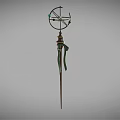 Vintage Metallic Decorative Pole With Intricate Top Structure And Green Ribbon Accent