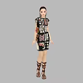 Woman in Black Dress with Various Patterns and Text Wearing Brown Strappy Sandals