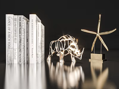 Modern Metallic Decorative Ornament Set With Books Rhinoceros And Starfish Figurines On Tabletop 3d model