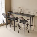 Modern Rattan Back Bar Stools By Black Counter With Light Wall And Natural Light