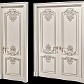 Classic White Double Doors With Ornate Carvings And Gold Door Handles
