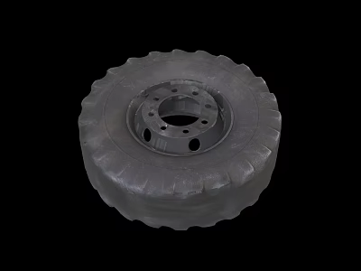 Solid Rubber Tire with Metal Rim and Multiple Holes Featuring Deep Tread Design 3d model