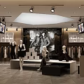 Modern Fashion Retail Store Interior With Clothes Racks Mannequins And Display Tables