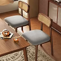 Dining Chairs With Wooden Frame Wicker Backrest And Gray Padded Seat In Cozy Interior
