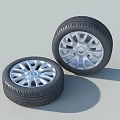 Car Tires Featuring Silver Spoke Wheels And Detailed Tread Pattern Design