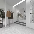 Modern Clothing Store Interior Design With Mannequins Clothing Racks And Green Plants