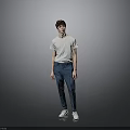 Young Man Standing In Gray Background Wearing White T Shirt And Blue Pants
