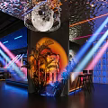 Stylish Bar Interior With Neon Lights Art Decor And Moon Lamp