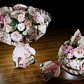 Beautiful Flower Bouquets With Pink Roses White Flowers Newspaper Wrapping Ribbon On Wooden Table