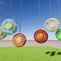 Colorful Spherical Pendant Lights with Woven Design Illuminating Green Grass Area