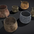 Handcrafted Clay Vessels with Textured Surfaces and Decorative Patterns for Daily Use