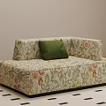 Floral Patterned Chaise Lounge With Green Cushion On Black And White Checkered Rug