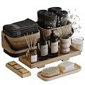 Natural Bathroom Washing Essentials With Black Towels Wooden Baskets Soap Bottles And Candles