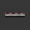 Red And White Striped Concrete Barrier With Worn Marks And Reflection On Black Background