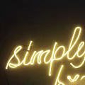 Glowing Yellow Simply Breathe Neon Sign Decor On Dark Wall