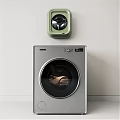 Green Wall Mounted and Gray Front Load Washing Machines on Wall and Floor