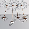 Elegant Modern Chandelier with Multiple Transparent Glass Spheres and Metallic Details