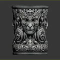 Ornate Metallic Cylindrical Container With Intricate Face Carvings And Decorative Patterns