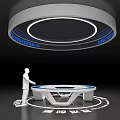 Person Operating Futuristic Interactive Table With Circular Digital Display And Blue Data