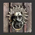 Vintage Lion Head Carved Door Knocker On Classical Stone Door Surface