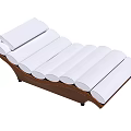 Modern Lounge Chair With Brown Frame And Multiple White Cylindrical Cushions