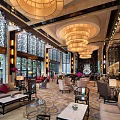 Luxurious Hotel Lobby With Elegant Chandeliers Chinese Lattice Windows Comfortable Seating Areas And Natural Light