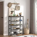 Modern Multi Tier Shoe Rack With Metal Frame Wooden Top And Decorative Items On Storage Shelves