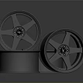 Three Silver Alloy Car Wheels Stacked As High Quality Automotive Parts