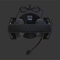Black Over Ear Gaming Headphones With Comfortable Fit Green Accents Ergonomic Design On Stand