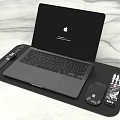 Apple Laptop on Black Desk Organizer Tray with Mouse USB Drive and Pens