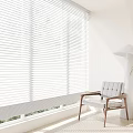 White Pleated Curtains in Bright Room with Wooden Armchair Floor Lamp and Green Plant