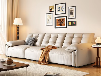 Cream Colored Leather Three Seater Sofa with Throw Blanket and Wall Art in Living Room 3d model