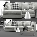 Modern Sofa and Coffee Table Set With Gray Pillows Black Vases and Decorative Items