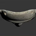 Ancient Carved Stone Mask With Textured Surface Facial Features Displayed On Dark Background