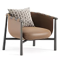 Modern Brown Leather Accent Chair With Black Metal Frame And Geometric Pattern Pillow