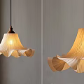 Stylish Pendant Light With Wooden Base And Pleated Shade On Gray Wall