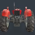 Red Functional Tractor With Large Tires And Seat