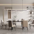 Modern Dining Room Interior With Round Table Beige Chairs Pendant Lights And Area Rug