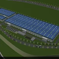 Modern Industrial Factory Complex With Blue Roofs Green Grass And Surrounding Roads